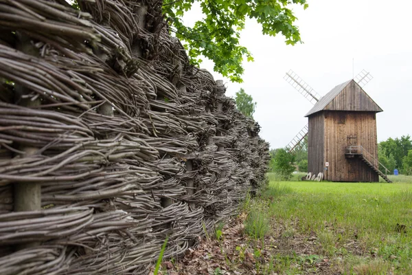 Village fence and mill — Stock Photo, Image