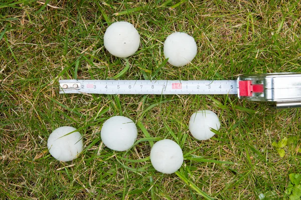 Hail on the grass after the storm — Stock Photo, Image