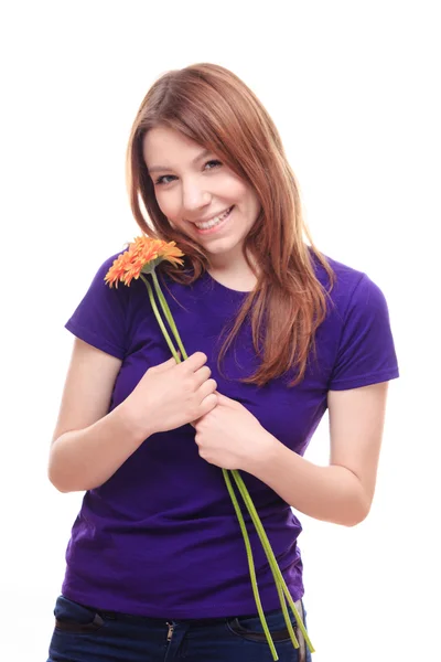 Woman holding flowers — Stock Photo, Image