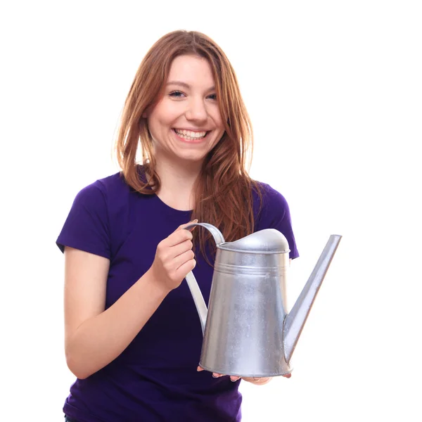 Young girl with watering can — Stock Photo, Image