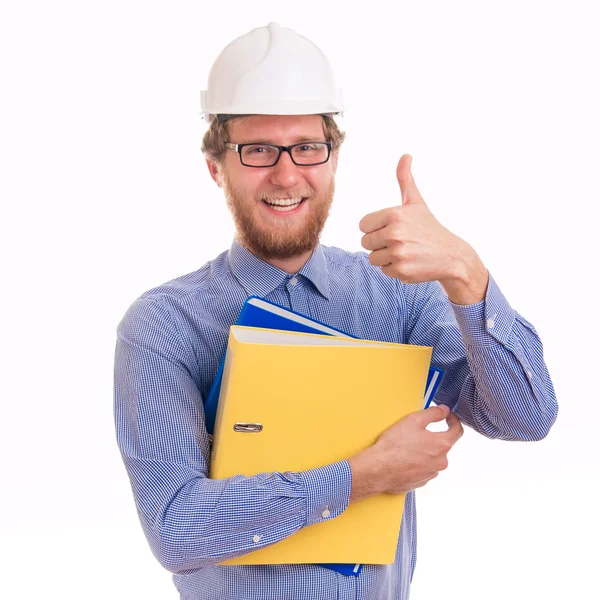 Молодой счастливый инженер в шлеме — стоковое фото