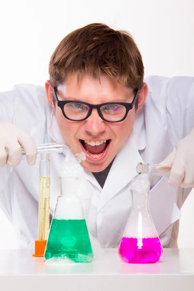 Scientist doing chemical reactions — Stock Photo, Image