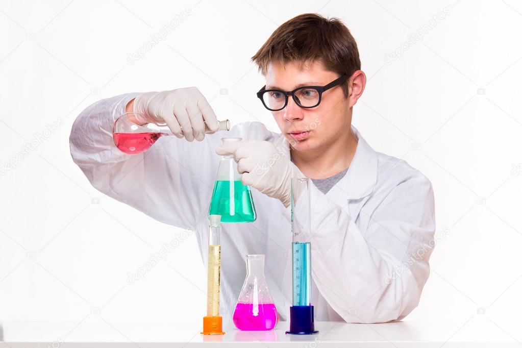 scientist doing chemical reactions