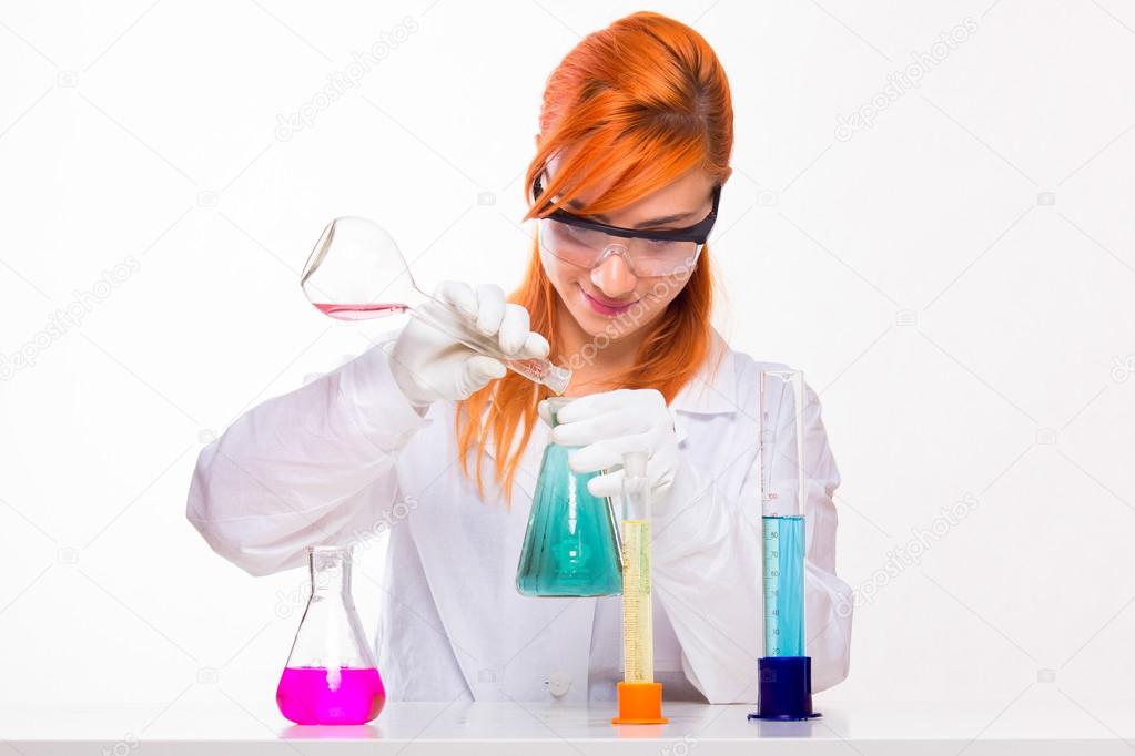 Chemist woman making experiment