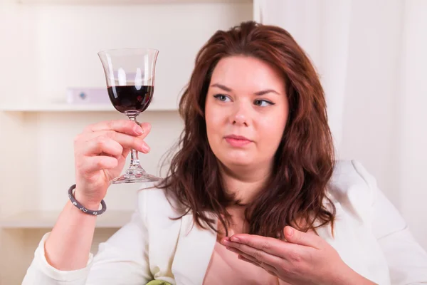 Elegant woman drinking wine — Stock Photo, Image