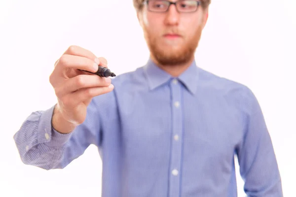 Junger Mann schreibt auf transparente Tafel — Stockfoto