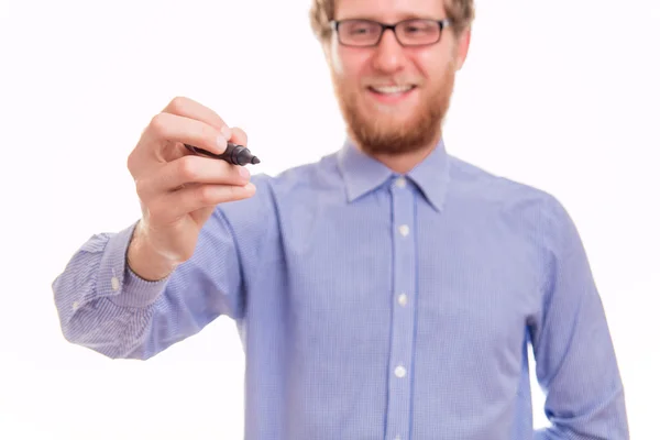 Joven hombre feliz escribiendo en tablero transparente — Foto de Stock