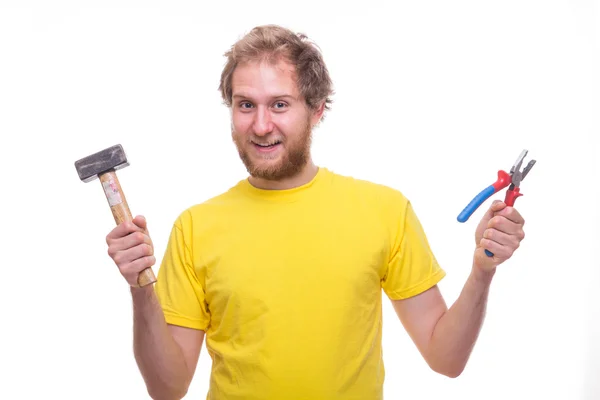 Homem com martelo e alicate — Fotografia de Stock