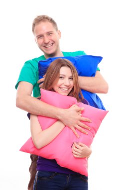 erkek ve kız renkli yastıklar holding