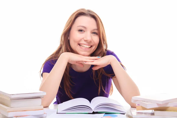 Jovem estudando com livros — Fotografia de Stock