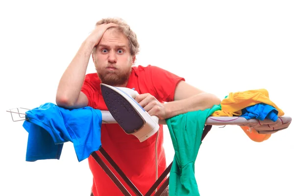 Sad man ironing clothes — Stock Photo, Image