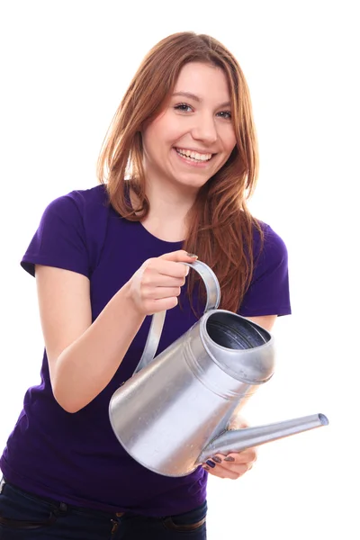Young woman with watering can — Stock Photo, Image