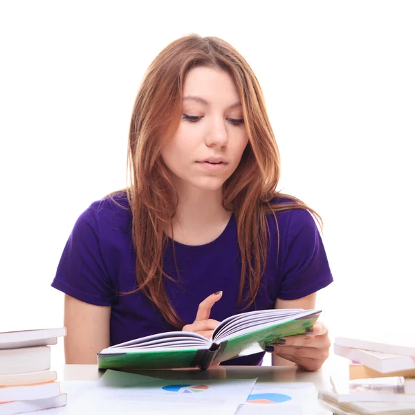 Νεαρή γυναίκα μελετώντας με βιβλία — Φωτογραφία Αρχείου