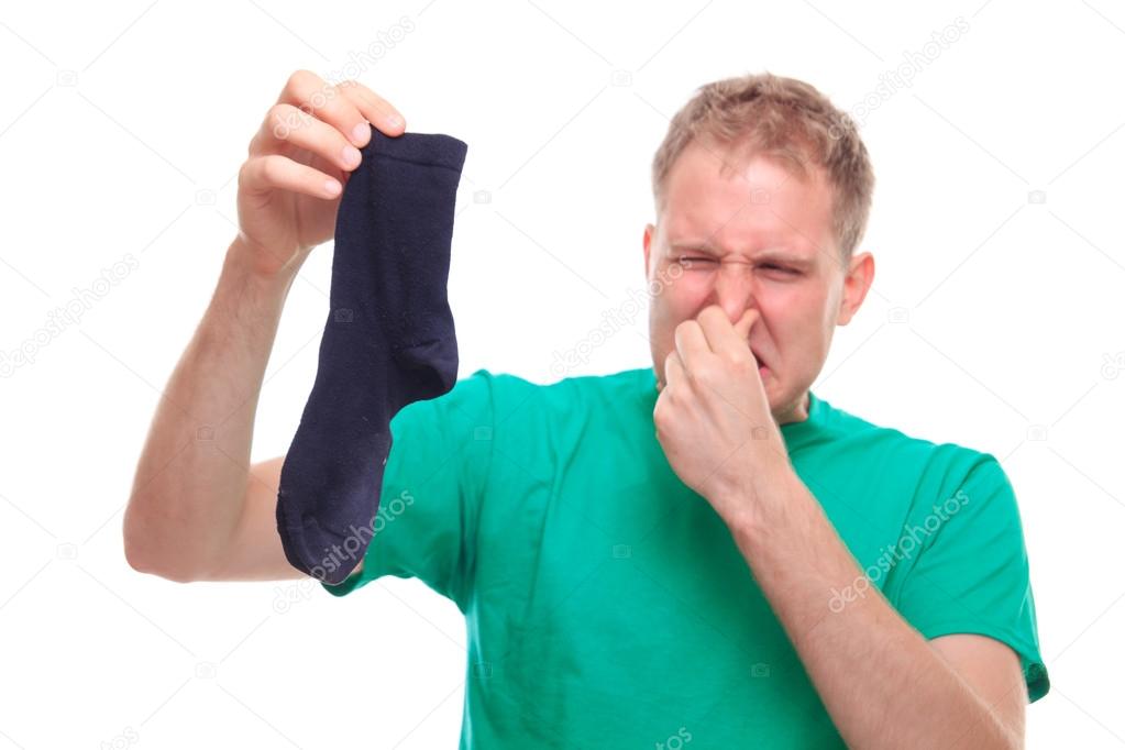 Man holding smelly sock 