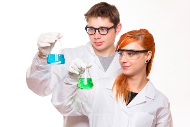Two students in chemistry laboratory clipart