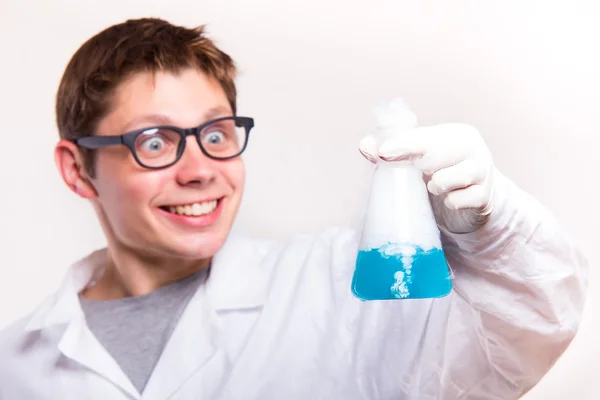 Surprised chemist in laboratory — Stock Photo, Image