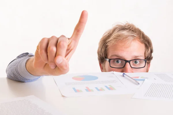 Frightened man under the desk would like to say something — Stock Photo, Image