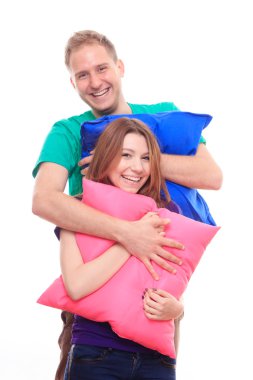 erkek ve kız renkli yastıklar holding