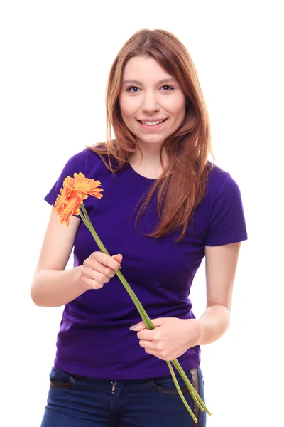 Pretty woman holding flowers — Stock Photo, Image
