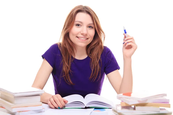 Jovem estudando com livros — Fotografia de Stock