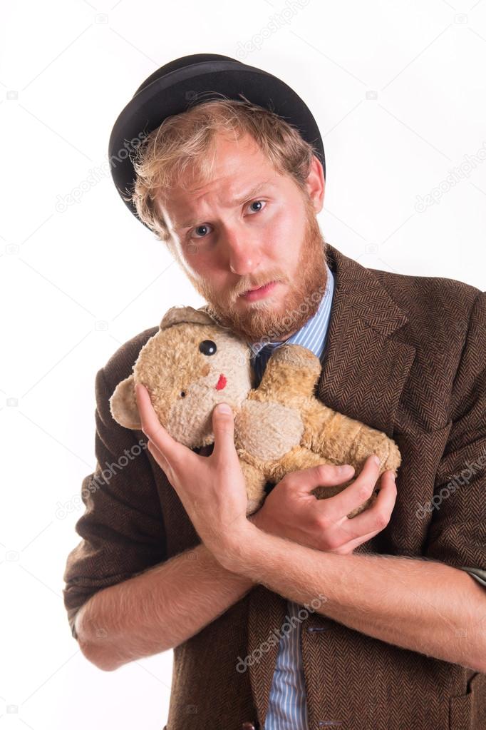 sad man with teddy bear
