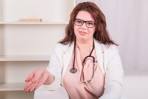 Young doctor is waiting for patient — Stock Photo, Image