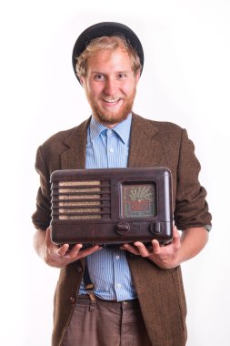 Old-fashioned man holding an old radio clipart