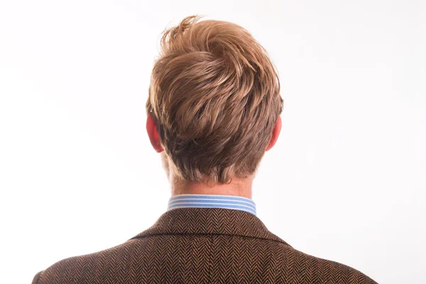 Baksidan av huvudet och håret på en ung man — Stockfoto