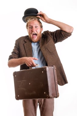 Funny traveler bearded man with an old suitcase clipart