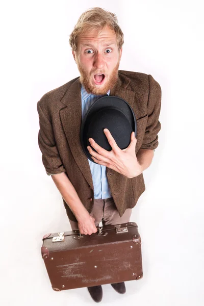 Lost traveler man with  old suitcase — Stock Photo, Image