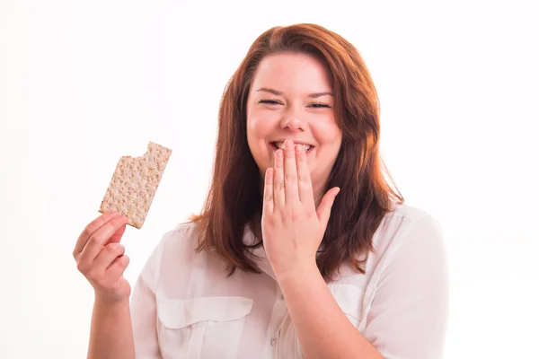 Lågt kaloriinnehåll bröd i kvinnans hand — Stockfoto