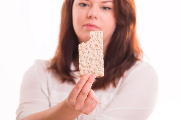 Low-calorie brood in dames hand — Stockfoto