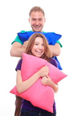 erkek ve kız renkli yastıklar holding