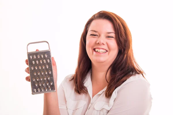 Woman holding kitchen grater — Stock Photo, Image