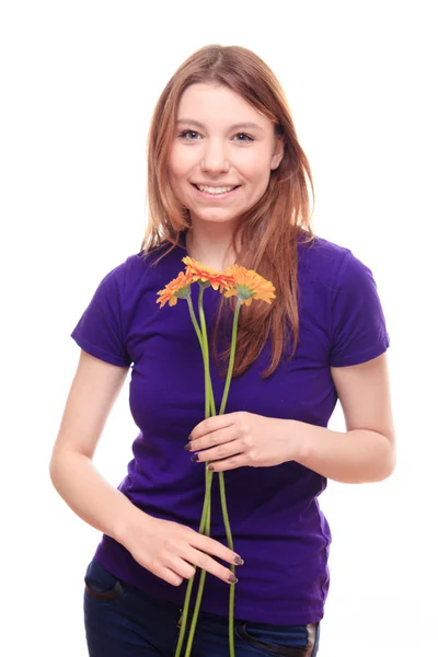 Pretty woman holding flowers — Stock Photo, Image