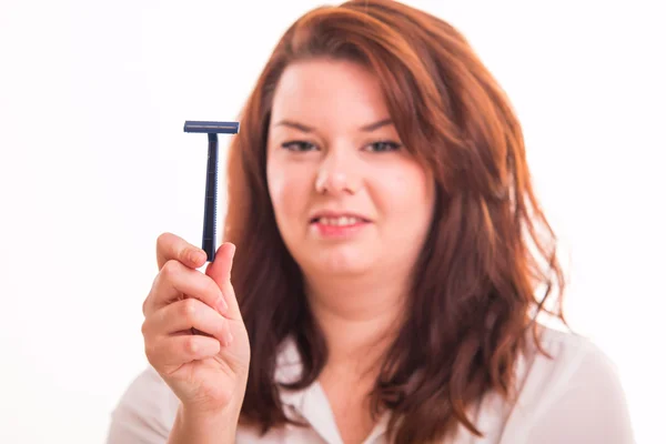 Plump woman with razor — Stock Photo, Image