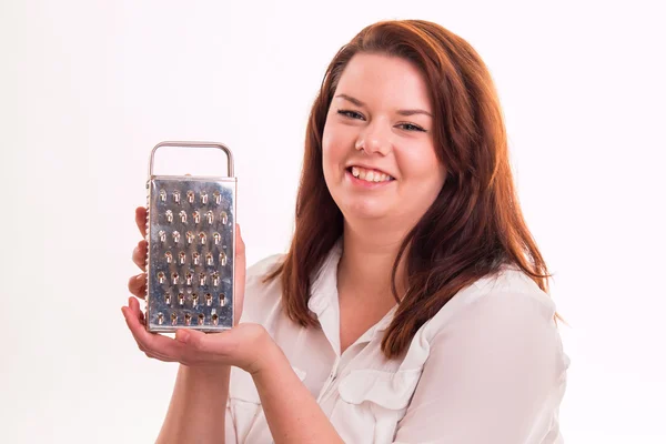 Woman holding kitchen grater — Stock Photo, Image