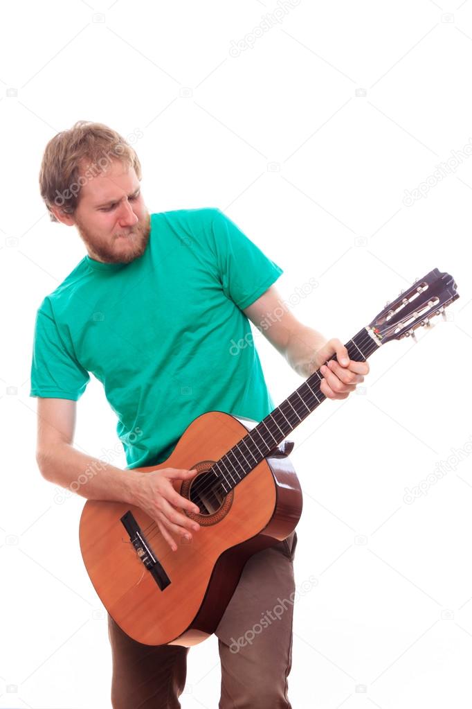 bearded man with guitar