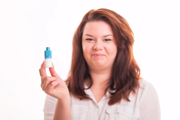 Woman holding eye drops — Stock Photo, Image