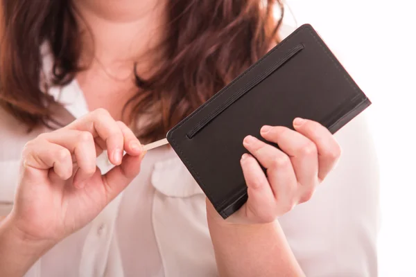 Femme avec petit carnet — Photo