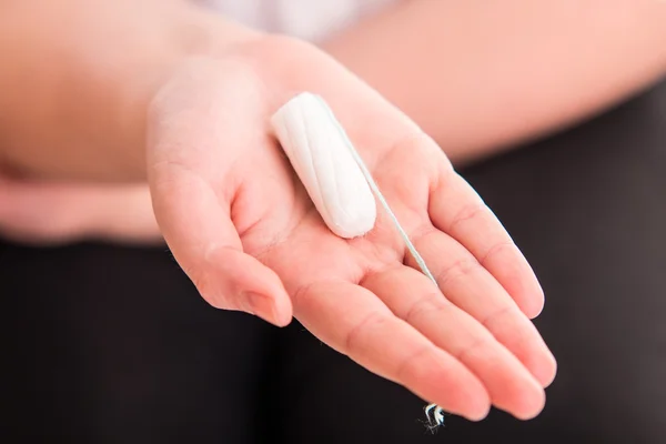 Woman holding intravaginal tampon — Stock Photo, Image