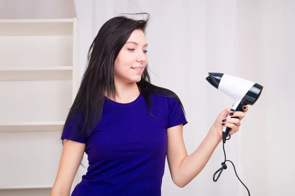 Young girl drying hair — Stock Photo, Image