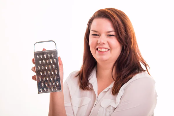 Woman holding kitchen grater — Stock Photo, Image