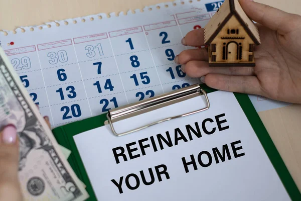 Refinance Your Home Word Folder Background Women Hands House Money — стоковое фото