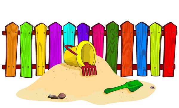 Kbelík a rýč na písku. — Stockový vektor