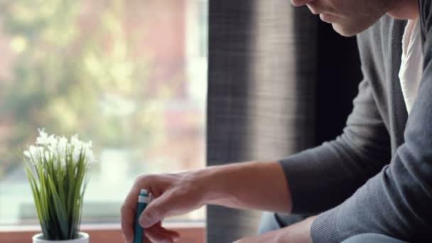 Close up of a man writing something in a notebook — Stock Video