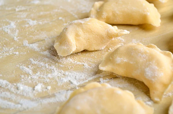 Pierogy sobre una mesa de madera rústica —  Fotos de Stock