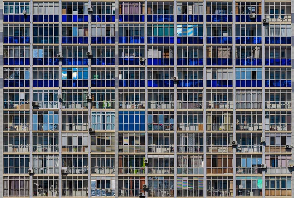 Pattern from colorful balconies in modern residential building. The texture of the building facade with balcony.