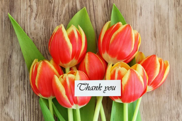 Dankeschön-Karte mit roten und gelben Tulpen — Stockfoto
