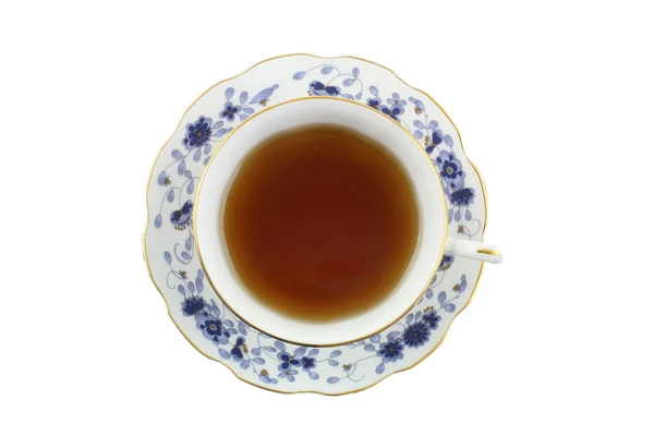 Tea in vintage porcelain cup with blue pattern, isolated on white — Stock Photo, Image